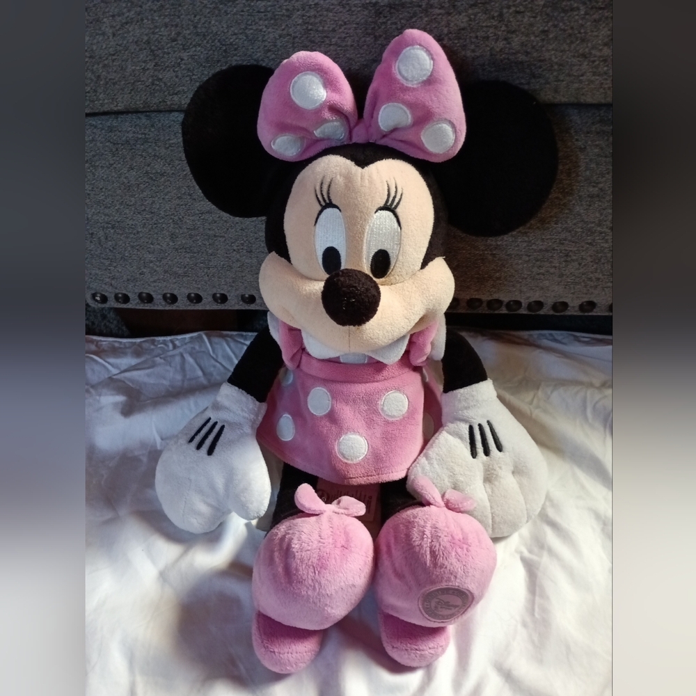 Disney Store Exclusive Pink Minnie Mouse plush doll stands at 14 inches tall